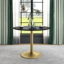Koldfield Steel Base Round Dining Table - HOMES: Inside + Out